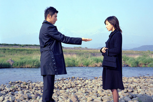 Peace offering · Masahiro Motoki (left) and Ryoko Hirosue (right) star as husband and wife in Yojiro Takita’s “Departures,” a contemplative drama that examines the lives of nokanshi, the preparers of corpses.