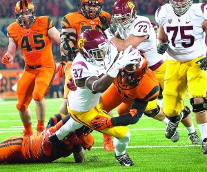 Diving right in · Redshirt sophomore tailback Javorius “Buck” Allen (pictured) teamed with senior running back Silas Redd to total 273 rushing yards for the Trojans. Allen also scored a career-high three touchdowns. - William Ehart | Daily Trojan 