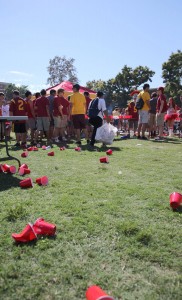 Red to green · Red Solo cups litter the ground at a tailgate for the Washington State game last year. ESA aims to reduce such waste. - Ralf Cheung | Daily Trojan 