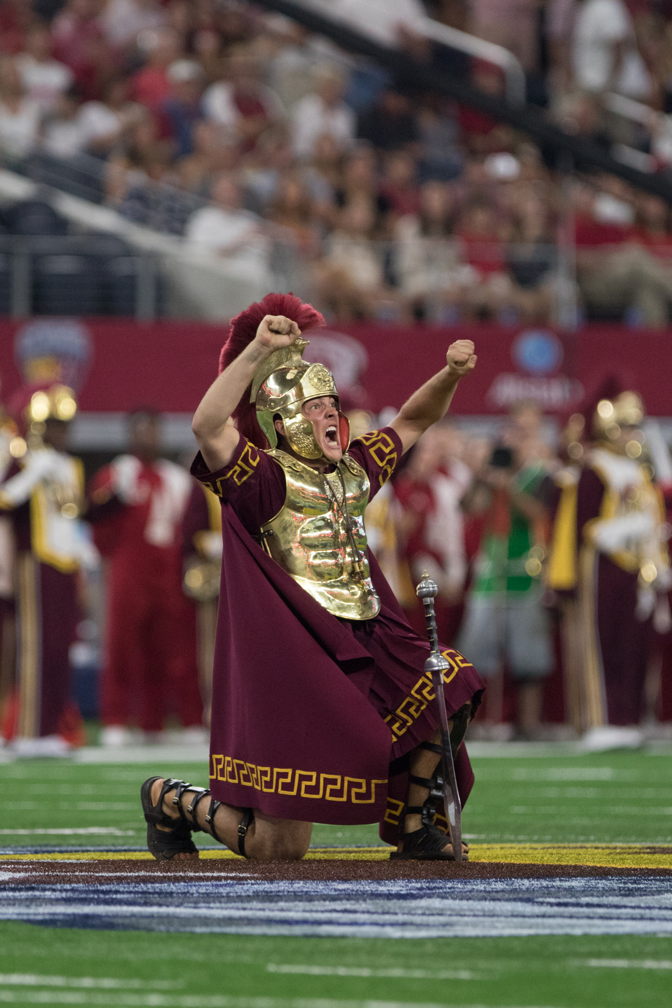 The Spirit of Troy Marching Band was led onto the field before the game by the drum major who started things off in his usual fashion — a sword in the ground.