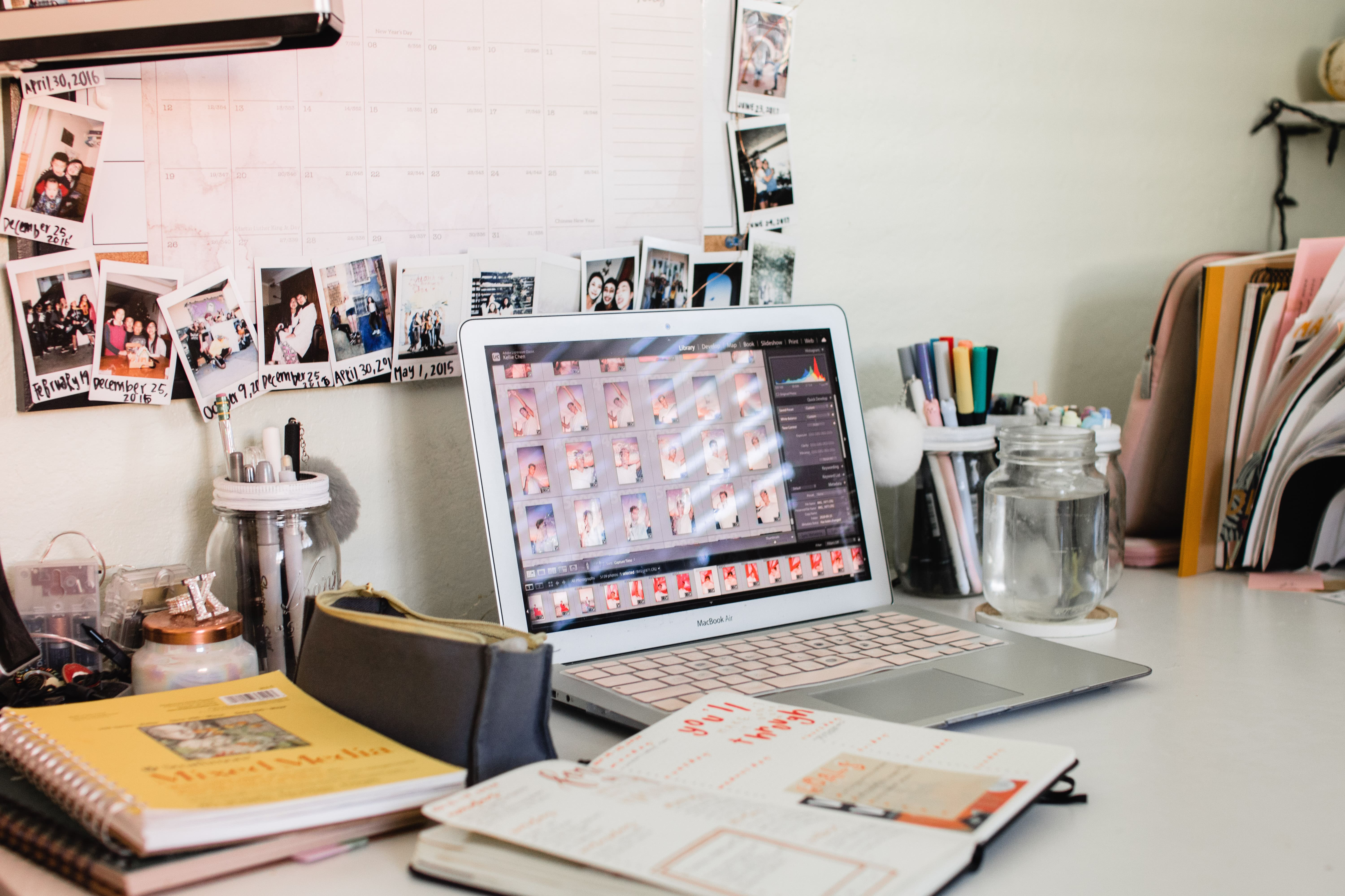 Desk with laptop and other items