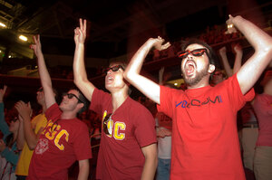 Alternate viewing · Wearing special glasses, a few of the more than 7,000 fans cheer wildly at the Galen Center while watching USC’s nail-biting 18-15 win in a pilot three-dimensional telecast produced by ESPN. - Young Kim | Daily Trojan