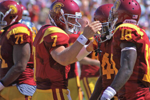 Cool kid · Matt Barkley (7) celebrates with Joe McKnight (4) and Damian Williams (18) Saturday at the Coliseum. The true freshman had a stellar outing in his first-ever start, throwing for 233 yards and one score. - Mike Lee | Daily Trojan