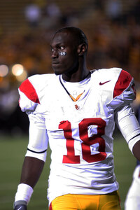 USC receiver Damian Williams was one of the many Trojans to paint their eye-black with the number 13 to honor injured teammate Stafon Johnson. Photo by Dieuwertje Kast | Daily Trojan