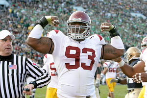 Trojan strength · Everson Griffen was penalized for flexing his muscles after a sack, but he and the Trojans were able to move on. - Dieuwertje Kast | Daily Trojan