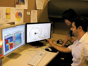 Mining data · Hui Shen looks on as Houtan Noushmehr (right) examines data. Both are Ph.D. students working with the Epigenome Center. - Dieuwertje Kast | Daily Trojan