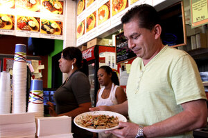 Good service ·  Tito Rivera, who fled a civil war in El Salvador to come to America, serves customers at his restaurant, Viztango Café. - Mike Lee | Daily Trojan