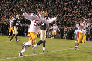 Taking flight · Sophomore linebacker Chris Galippo celebrates after the Trojans defense held off Notre Dame’s last-minute rally. Galippo anchors a defense that ranks fifth nationally, letting up only 11.7 points per game. - Dieuwertje Kast | Daily Trojan 