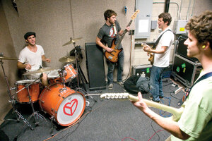 All night · The members of Y-Luv practice in a storage room at the Tau Kappa Epsilon fraternity house. The space has become the band’s jamming spot. - Nathaniel Gonzalez | Daily Trojan