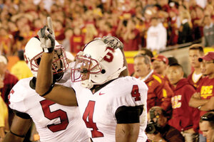 Unwelcome guests · Mark Bradford (4) and Anthony Kimble celebrate Stanford’s shocking 24-23 win over USC in the Coliseum in 2007. Bradford caught a last-minute touchdown from Tivita Pritchard to break USC’s 35-home game winning streak. - Joel Zink | Daily Trojan