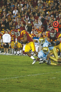 On the ball · Senior safety Will Harris intercepted a UCLA pass right after halftime for the USC defense’s third turnover of the night. - Tim Tran | Daily Trojan