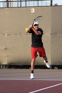 Given a chance · Senior Michael Tang, who previously served as team manager, played against UC Irvine in his first-ever match. - Ralf Cheung | Daily Trojan 