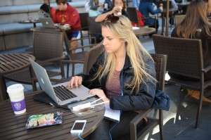 Caught in the Web · Catherine Price, a senior majoring in business administration and political science, uses USC Wireless to access the Web. - William Ehart | Daily Trojan