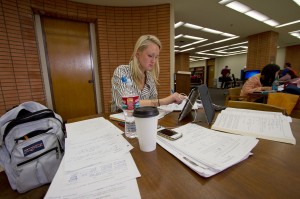 Online · Allie Beckemeyer, a post-baccalaureate student in the premedical program, uses the university’s libraries search engine on Tuesday while studying chemistry in the Von KleinSmid Center Library.  - Alexander Harsono | Daily Trojan 