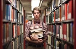 Book smart · Librarian Trevor Nelson, a sophomore majoring in mechanical engineering, stands inside the Doheny Library bookstacks. - Ralf Cheung | Daily Trojan 