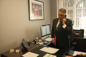 Quick chat · Dennis Cornell, chief of staff to President C. L. Max Nikias, answers a phone call in his office in Bovard Auditorium. - Rachel Bracker | Daily Trojan 