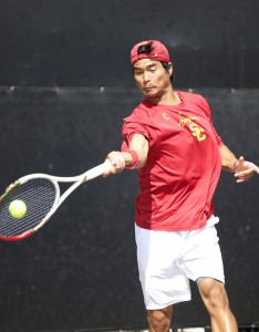 Leading the charge · Junior Ray Sarmiento (above) and the No. 5 seeded men’s tennis team have won four straight national championships heading into this year’s NCAA tournament, which begins on May 10. - Ralf Cheung | Daily Trojan 