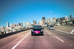 Need a Lyft? · The app Lyft helps students find a ride, and drivers are oftentimes distinguished by the pink mustaches on their cars. - Courtesy of Lyft 