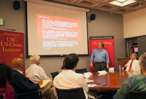 Media Blitz · Director of the USC U.S.-China Institute Clayton Dube speaks in front of panelists about the media coverage of the widely publicized meeting between President Obama and President Xi of China.  - William Ehart | Daily Trojan 