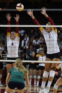 First line of defense · Senior middle blocker Alexis Olgard (1) and junior setter Hayley Crone (4) are key to the Women of Troy’s blocking. - Daily Trojan file photo 