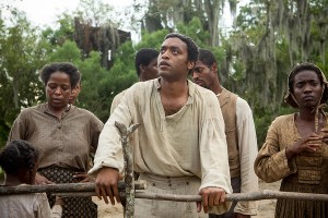 Emotion unchained · Chiwetel Ejiofor (center) gives a riveting performance in 12 Years a Slave as Solomon Northup, a free man from the North abducted and sold into slavery in the 19th century.  - Photo Courtesy of Fox Searchlight Pictures 