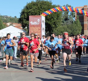 Run this city · Runners representing USC and UCLA compete at last year’s We Run This City 5K. The event pits the fundraising efforts of the two rival schools against one another to raise money for the Special Olympics. - Photo courtesy of Special Olympics of Southern California 