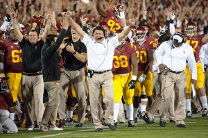 Making his mark · USC interim head coach Ed Orgeron celebrates during the Trojans’ dramatic 20-17 victory over Stanford. The win was the program’s first time beating the Cardinal since the 2008 season. - William Ehart | Daily Trojan 