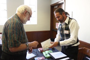 Down the rabbit hole · Author Raul Contreras signs copies of his book, Alice’s Bloody Adventure in Wonderland at Doheny Memorial Library. - Jessica Zhou | Daily Trojan 