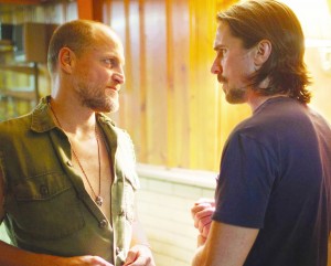 Family business · Woody Harrelson (left) is Harlan DeGroat, a cunning meth-addicted mountain man with a volcanic temper. Harrleson’s performance as DeGroat is his best since 1994’s Natural Born Killers. - Photo courtesy of Relativity Media 