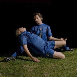 Mimicking Michelangelo's Pieta, this photograph turns the bodies of the players into art. — Photo courtesy of LACMA