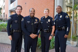 The blues · (Left to right): Deputy Chief David Carlisle, Chief John Thomas, Sergeant Leesa Sandell and Captain Ed Palmer don their new uniforms. The latest editions are a drastic departure from the department’s previous tan, beige and green outfits and will provide DPS officers with a sense of uniformity. Austin Vogel | Daily Trojan 