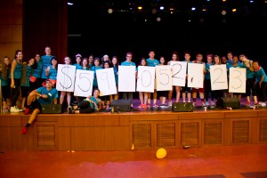 Dance for a cause · The Trojan Dance Marathon planning committee holds up the final fundraising total raised in the past year. - Austin Vogel | Daily Trojan 