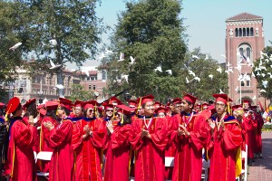 White doves fly out from the stage following the conclusion of the 131st Annual USC Commencement Ceremony. — Joseph Chen | Daily Trojan