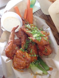 Finger lickin’ · Bird N Hand’s Harissa-spiced chicken wings are the perfect balance of a nice savory heat and sweetness. It pairs excellently with Pabst Blue Ribbon beer, which is sold by the can and served in a mason jar. - Euno Lee | Daily Trojan 