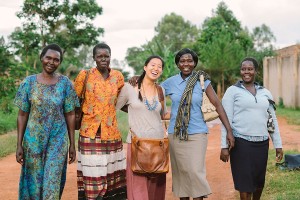 Say cheese · Alice Lee, center, poses with 31 Bits employees outside their office in Gulu, Uganda. Left to right: Grace, Florence, Betty, Jackie. - Photo courtesy of Alice Lee  