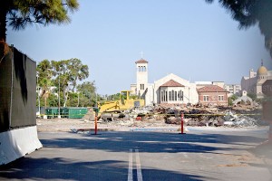  Rising from the ashes· The USC Caruso Catholic center can be seen beyond the rubble of the old, demolished University Village.  - Joseph Chen | Daily Trojan 