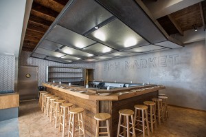 Fancy and functional · KazuNori has created a great setting by blending a central sushi bar and a communal seating area to allow for groups of all types to mingle together while they eat. - Courtesy of KazuNori 