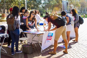 Rock the vote · Students celebrate National Voter Registration Day by registering to vote in Hahn Plaza. The event was           co-hosted by the Jesse M. Unruh Institute of Politics, USC College Democrats, USC College Republicans and others. — Liliana-Scarlet Sedano | Daily Trojan
