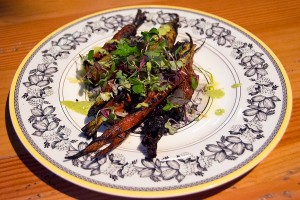 Surprising kick · Chef Roy Choi’s inventive take on vegetables are a hit — the carrot dish (pictured) consists of a few expertly grilled carrots topped with a pesto-like sauce with an unexpected bite.   -  Mariya Dondonyan | Daily Trojan 