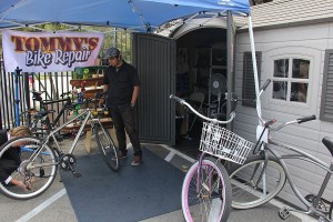 Fixing a flat · Tommy’s Bike Repair, located at the corner of Jefferson Boulevard and Hoover Street, is stocked with 200 different bicycle parts. - Michelle Wolzinger | Daily Trojan 