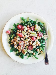 A healthy alternative · Tomato and chickpea salad with yogurt dressing is a perfect example of a substantial salad that can provide vegetables and lean proteins as an alternative to fatty foods while facing off with an exam. - Maral Tavitian | Daily Trojan 