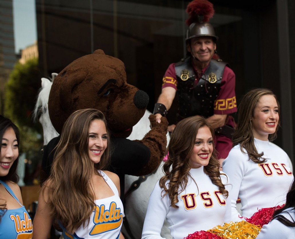 Burying the hatchet · The USC Song Girls, UCLA Spirit Girls and mascots Traveler and Joe Bruin participate in the rally Wednesday. - Mariya Dondonyan | Daily Trojan 