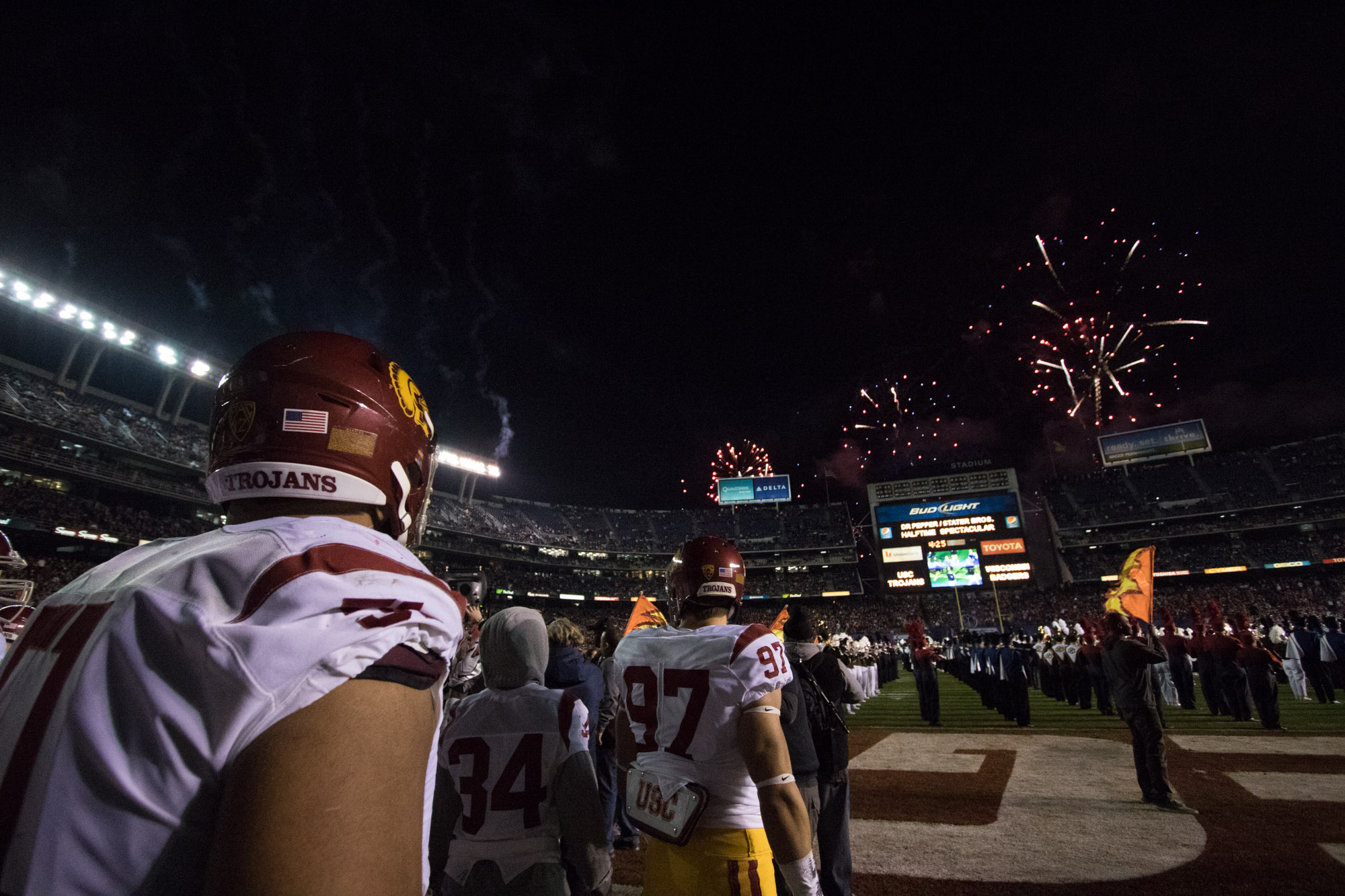 USC players walk out of the tunnel at the end of halftime to fireworks and a performance by a group of high school bands. Nick Entin | Daily Trojan
