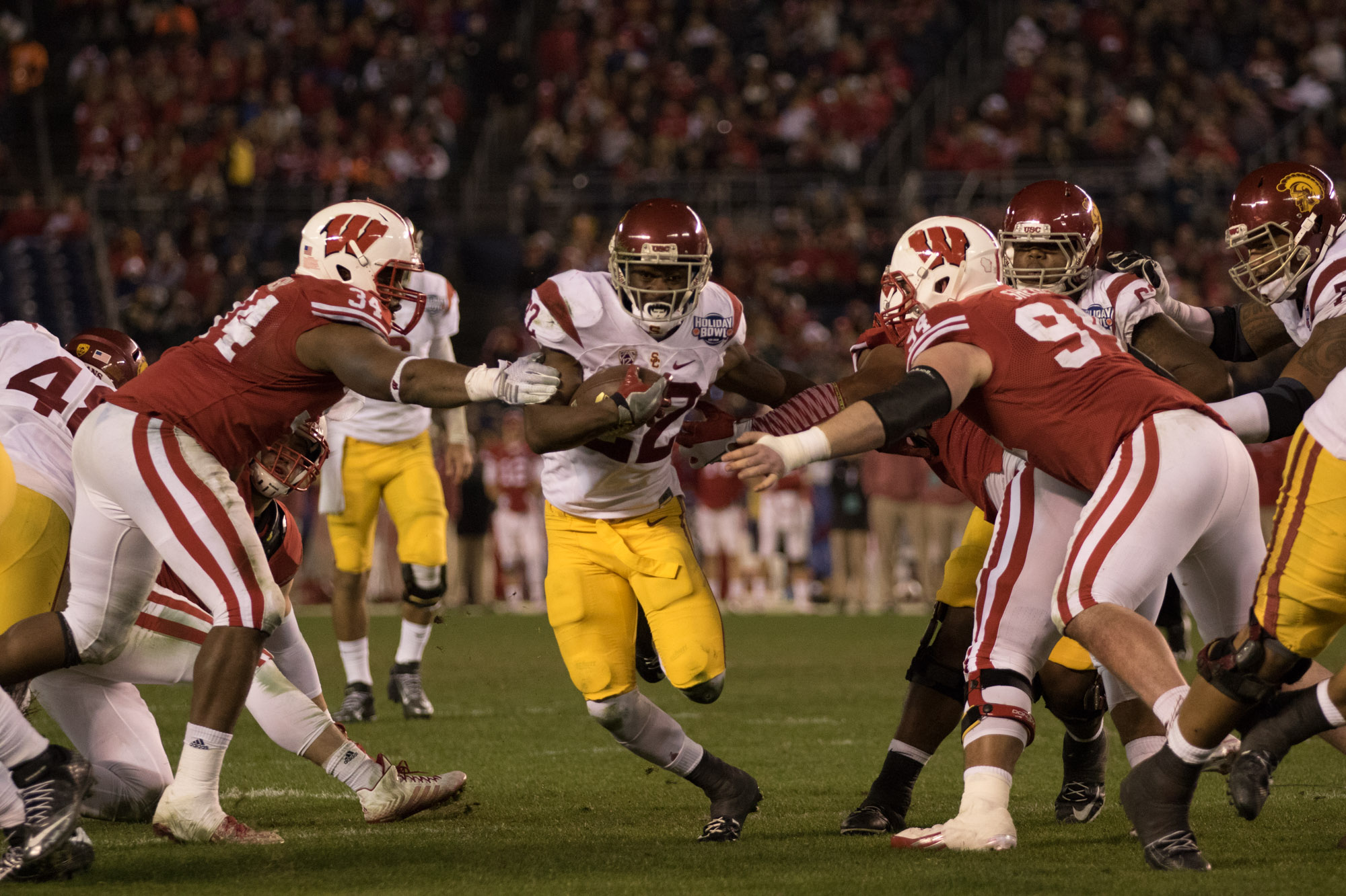 Justin Davis finds an opening in the Wisconsin defense. Nick Entin | Daily Trojan