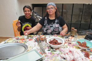 My host mom and I preparing for the barbecue.