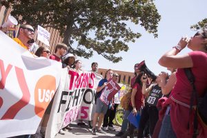 Joseph Chen | Daily Trojan Forward march · USC Faculty Forward, a precursor to the Faculty Union, holds a rally on campus in April 2015 to encourage support for higher wages and better benefits for the University’s non-tenure track faculty. 