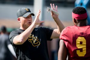 Brian Chin | Daily Trojan Helton’s hot takes · First-year head coach Clay Helton continues to struggle with off-the-field distractions. On Tuesday, internet rumors of a locker room altercation quickly spread before being put to rest at practice.