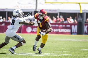 Brian Chin | Daily Trojan The Stanford standard · Senior tailback Justin Davis and the Trojans suffered two losses to the Cardinal last season including a 41-22 blowout in the Pac-12 Championship game in December.