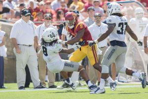 Nick Entin | Daily Trojan Getting JuJu involved · Junior wide receiver JuJu Smith-Schuster’s turns upfield after a reception against Utah State. He had just four combined catches against Alabama and Stanford, but caught eight passes last Friday. 