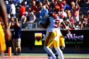 JuJu Smith-Schuster celebrates after catching one of his three touchdown passes - Sydney Richardson / The Daily Wildcat
